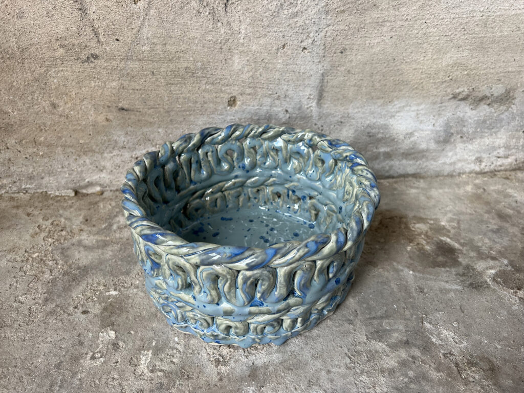 teal pot form above with braided look.