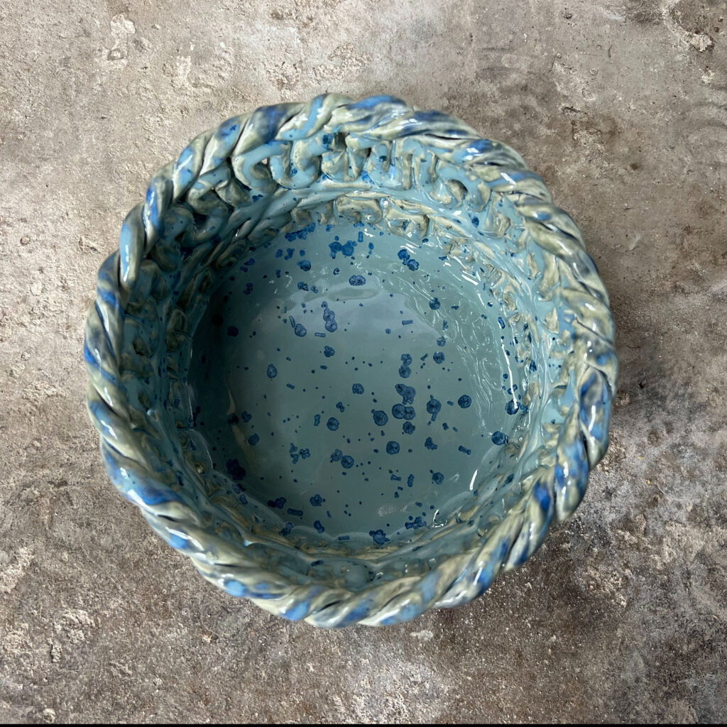 teal pot form above with braided look.