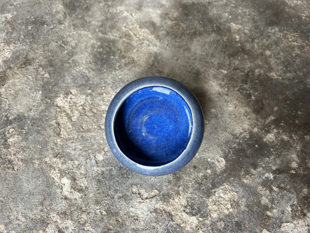 glossy blue round bowl