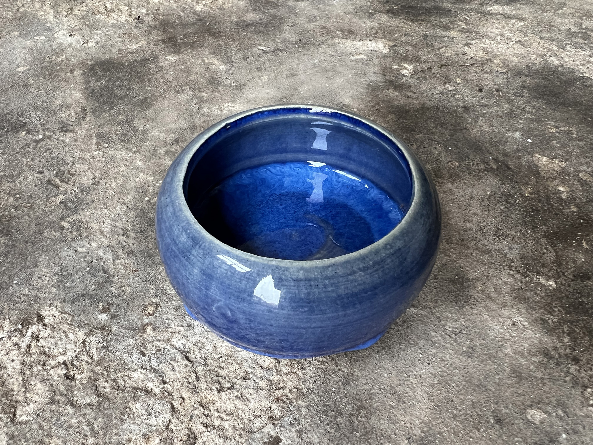 glossy blue round bowl