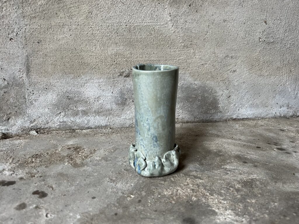 Teal vase from the side