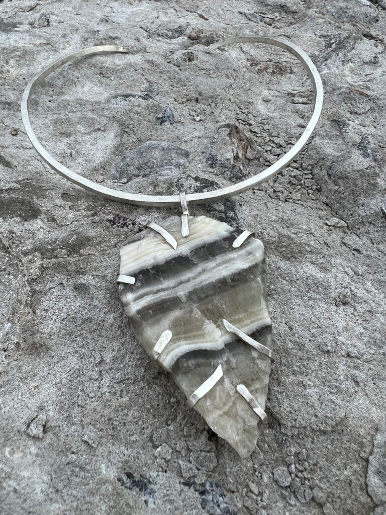 raw zebra cilvet necklace