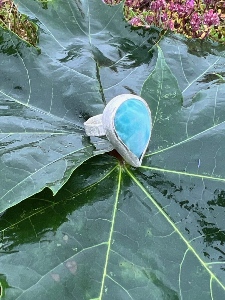 sterling silver ring with pearshaped larimar crystal