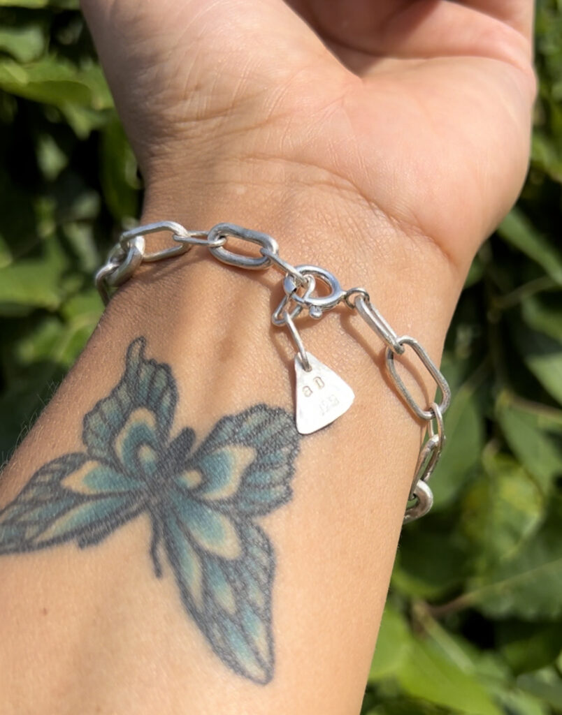 handmade silver chain bracelet with cabochon cut welo opal