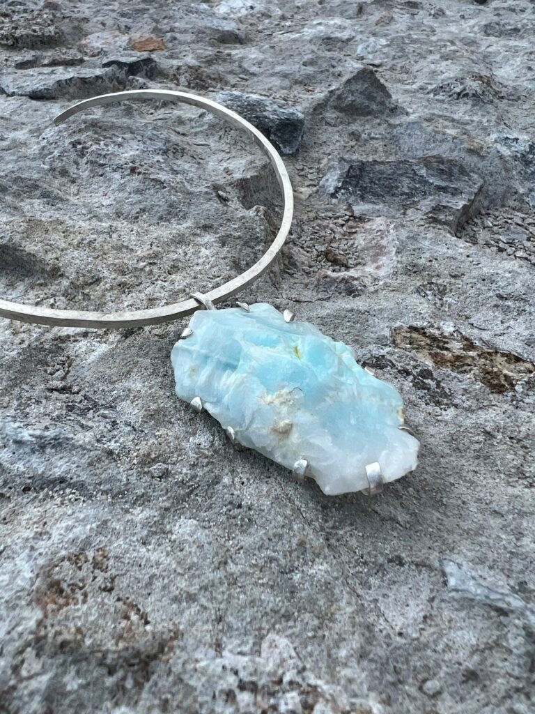 raw turquoise blue aragonite from lavrion in greece, organically set in sterling silver on a brushed silver neck ring