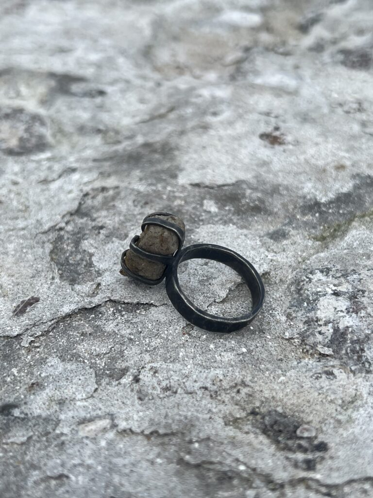 oxidized silver ring with clawsetting